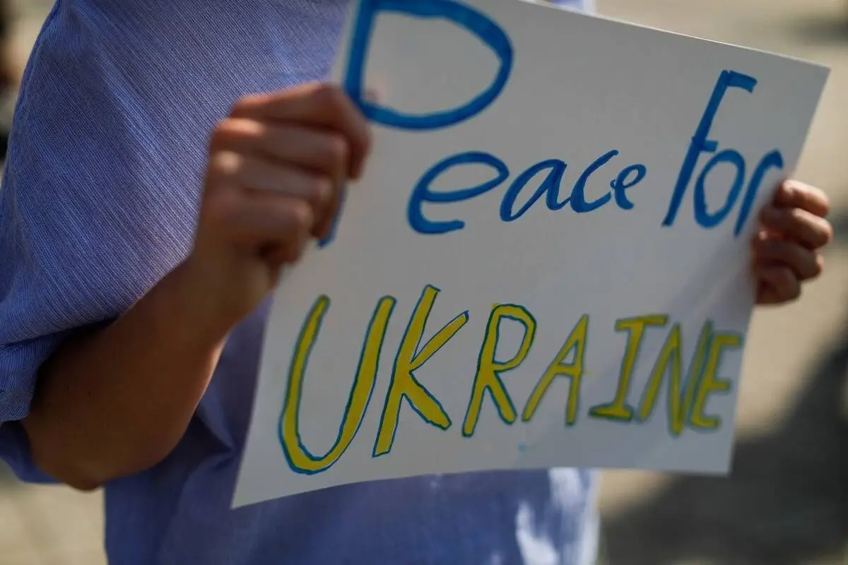 Manifestaciones contra la invasión Ucraniana, Agencia Uno