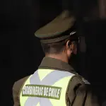 un carabinero vestido con un uniforme verde y un sombrero verde