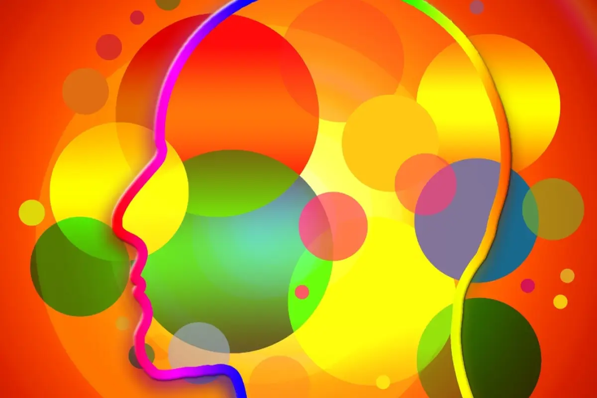 una ilustración multicolor donde se ve una silueta humana para explicar la empatía