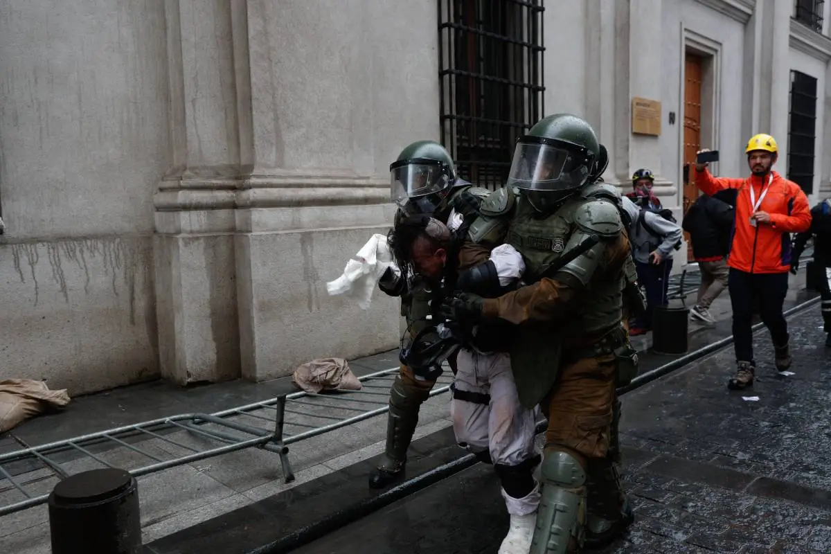 encapuchados la moneda