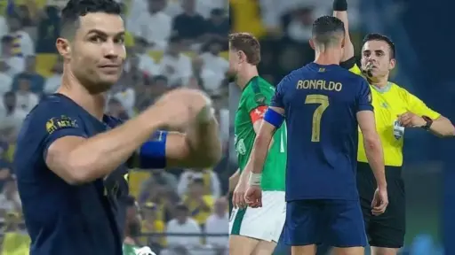 árbitro Piero Maza mostrándole tarejeta amarilla a Cristiano Ronaldo