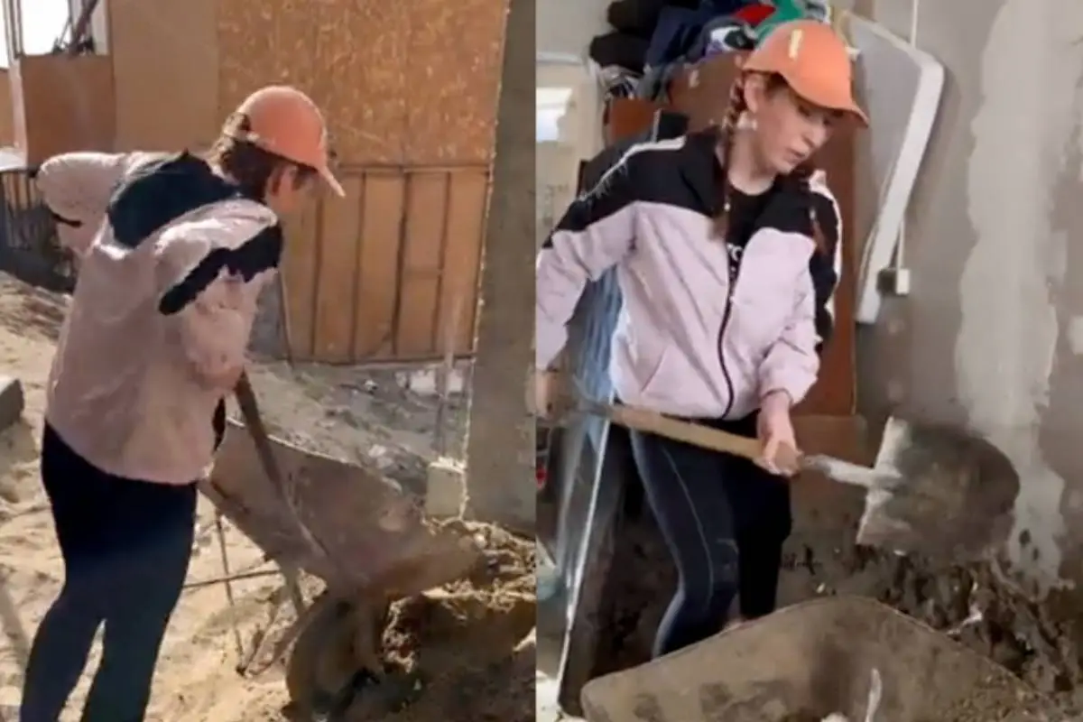 diputada Catalina Pérez ayudando con una pala en una construcción