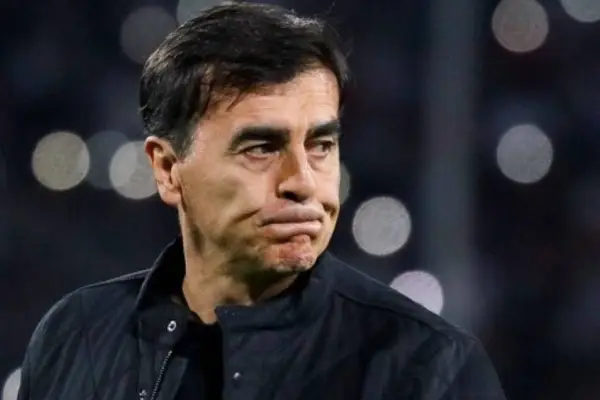 Gustavo Quinteros ,