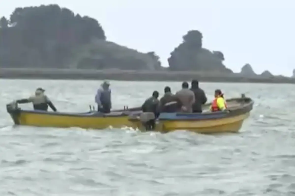 Labores de búsqueda de los pescadores, T13