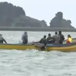 Labores de búsqueda de los pescadores, T13