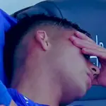 Lucas Assadi salió lesionado en el clásico, Captura