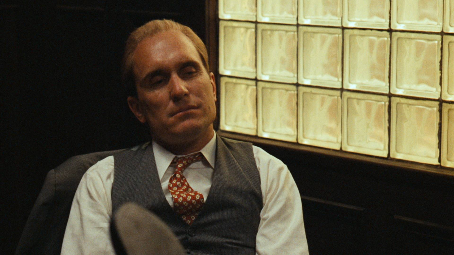 Robert Duvall como Tom Hagen en 